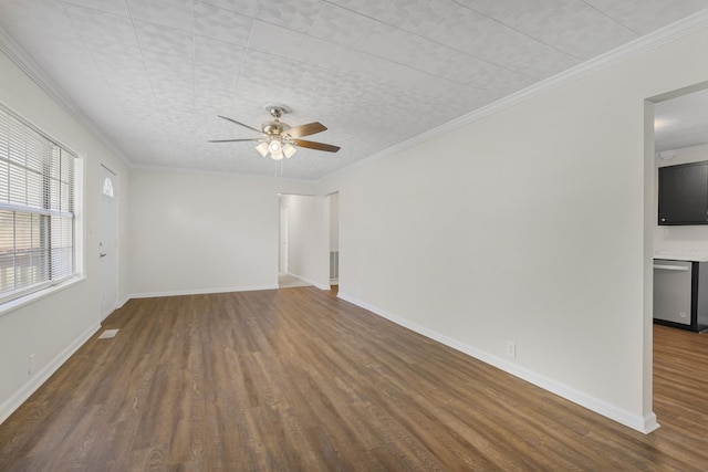 unfurnished living room with dark wood-style flooring, ceiling fan, baseboards, and ornamental molding