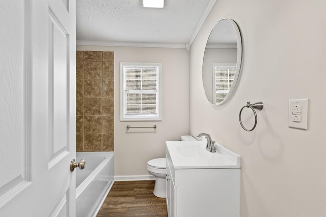 full bath with toilet, crown molding, vanity, a textured ceiling, and wood finished floors