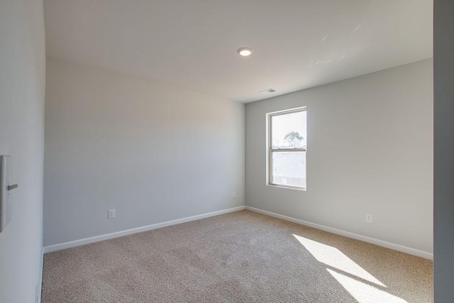 4017 Roane Dr, White House, TN 37188 - carpeted empty room with baseboards and recessed lighting