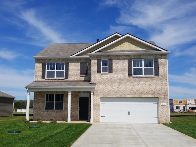 4017 Roane Dr, White House, TN 37188 - view of front facade featuring concrete driveway, an attached garage, and brick siding