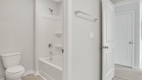 4017 Roane Dr, White House, TN 37188 - full bathroom featuring baseboards, toilet, and bathing tub / shower combination