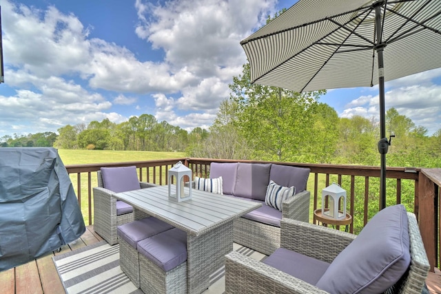 deck featuring outdoor lounge area, a lawn, and outdoor dining area