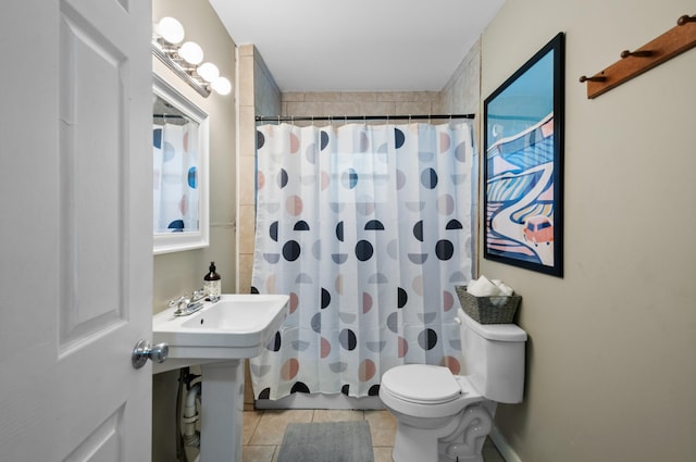 407 High St, Dickson, TN 37055 - bathroom featuring tile patterned flooring, a shower with curtain, and toilet