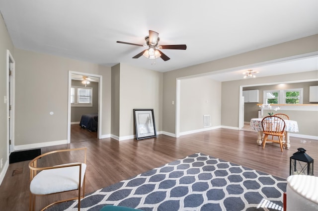 407 High St, Dickson, TN 37055 - living room with a ceiling fan, wood finished floors, and baseboards