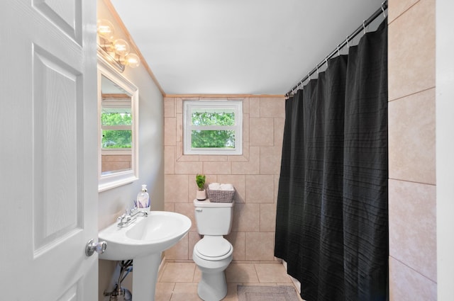 407 High St, Dickson, TN 37055 - full bath with toilet, tile patterned floors, curtained shower, and tile walls