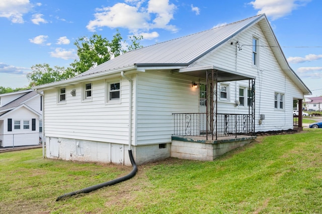 407 High St, Dickson, TN 37055 - rear view of house with a yard, a porch, metal roof, and crawl space