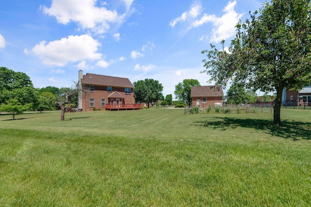 view of yard with a wooden deck