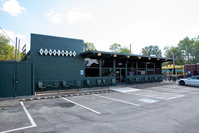 uncovered parking lot with fence