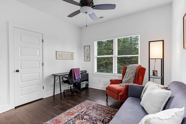 office area featuring wood finished floors, ceiling fan, and baseboards