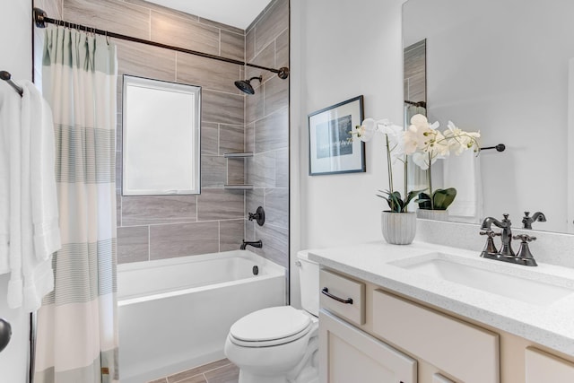 full bathroom featuring shower / bathtub combination with curtain, vanity, and toilet