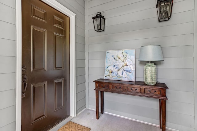 entrance to property featuring a porch