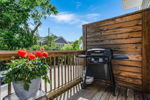 wooden terrace with grilling area