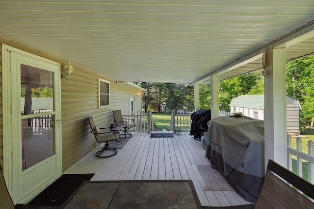 deck featuring a grill