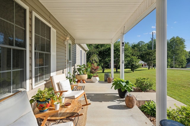 view of patio featuring a porch