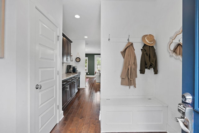 mudroom with dark wood-style floors and recessed lighting