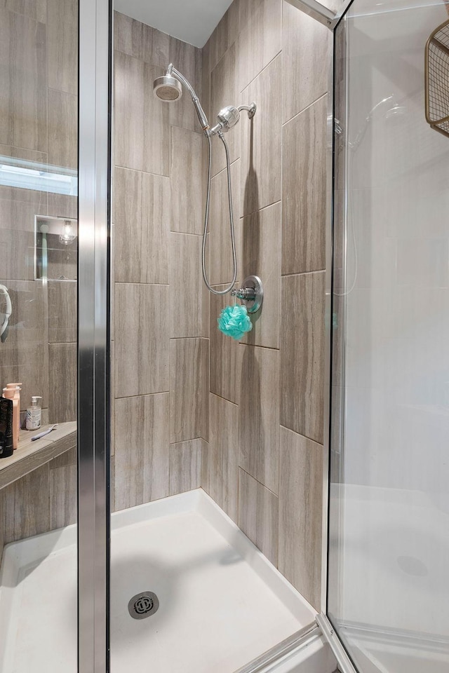 full bathroom with a shower stall
