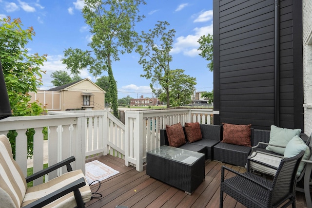 deck with an outdoor hangout area