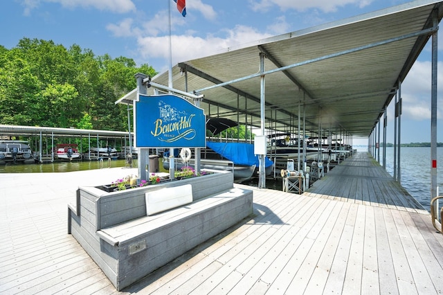 dock area featuring a water view and boat lift