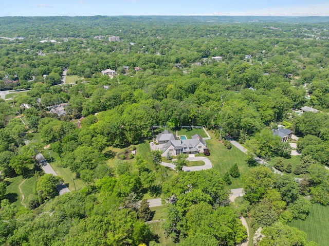 drone / aerial view of a heavily wooded area