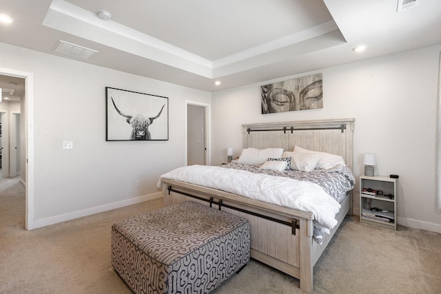 bedroom with light carpet, a raised ceiling, recessed lighting, and baseboards