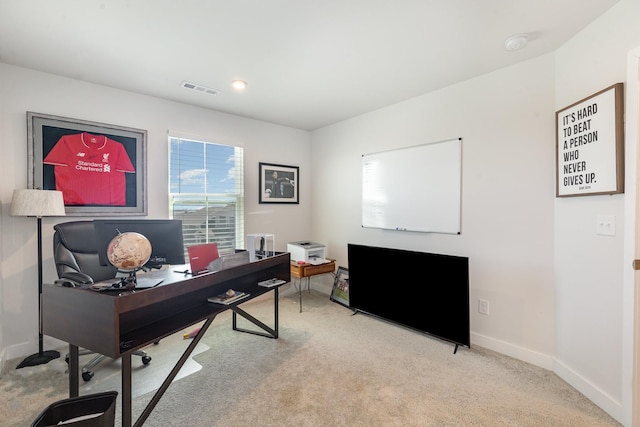 office featuring carpet and baseboards