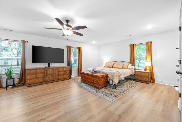 5921 Keysburg Rd, Adams, TN 37010 - bedroom with multiple windows, light wood-style floors, ceiling fan, and recessed lighting