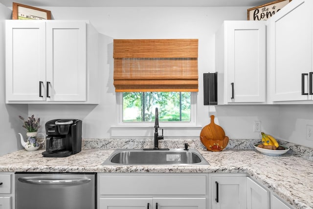 5921 Keysburg Rd, Adams, TN 37010 - kitchen with dishwasher, a sink, white cabinetry, and light countertops