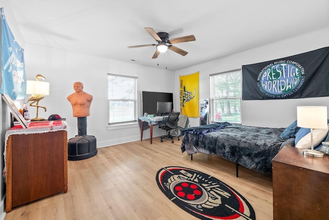 5921 Keysburg Rd, Adams, TN 37010 - bedroom featuring wood finished floors, baseboards, and a ceiling fan