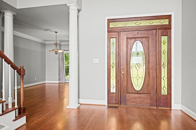1709 Wildlife Trl, Kingston Springs, TN 37082 - entryway featuring plenty of natural light, wood finished floors, baseboards, and crown molding