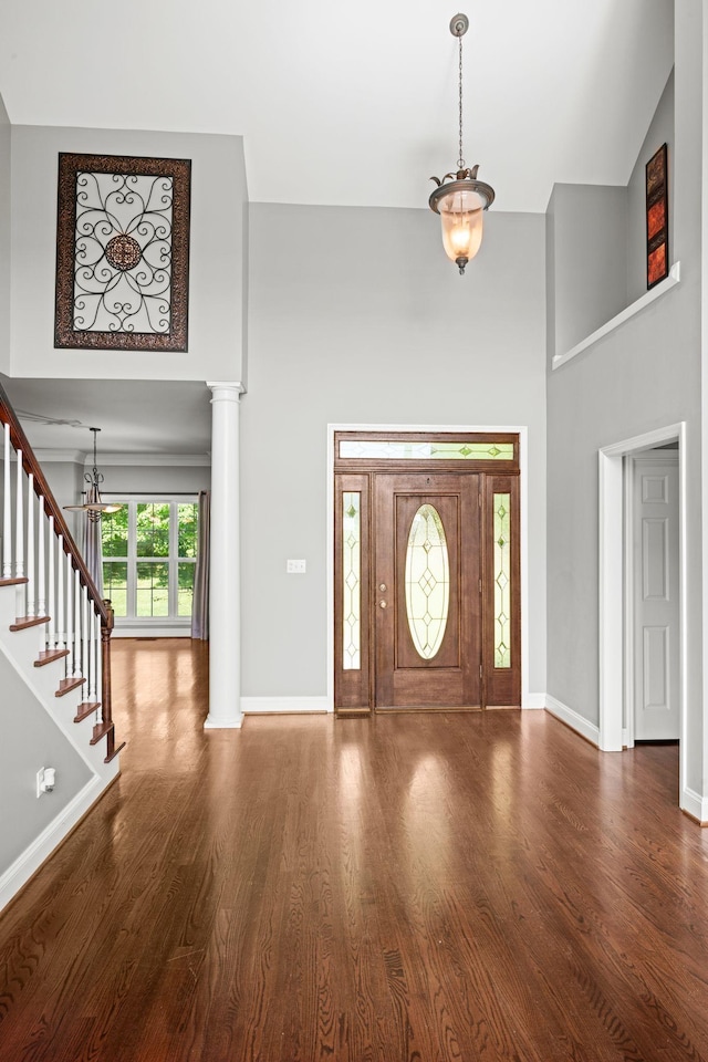1709 Wildlife Trl, Kingston Springs, TN 37082 - entrance foyer with a high ceiling, wood finished floors, a chandelier, baseboards, and stairs