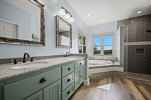 1709 Wildlife Trl, Kingston Springs, TN 37082 - full bathroom featuring a bath, double vanity, tiled shower, wood finished floors, and recessed lighting