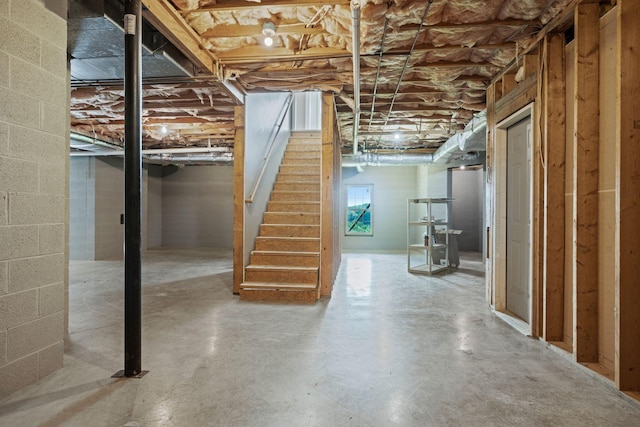1709 Wildlife Trl, Kingston Springs, TN 37082 - below grade area featuring stairs and concrete block wall