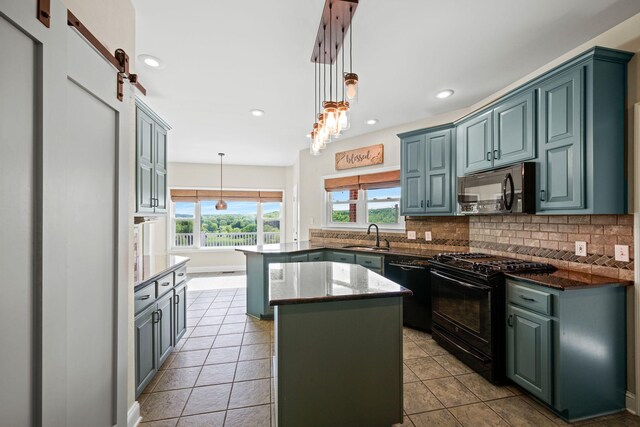 1709 Wildlife Trl, Kingston Springs, TN 37082 - kitchen with black appliances, decorative backsplash, a sink, dark stone counters, and recessed lighting