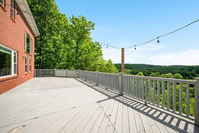 1709 Wildlife Trl, Kingston Springs, TN 37082 - wooden deck with a wooded view