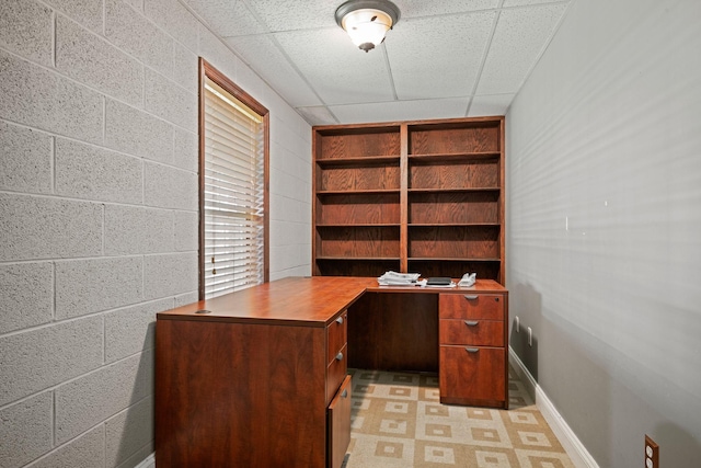 1709 Wildlife Trl, Kingston Springs, TN 37082 - unfurnished office with a drop ceiling, concrete block wall, and baseboards