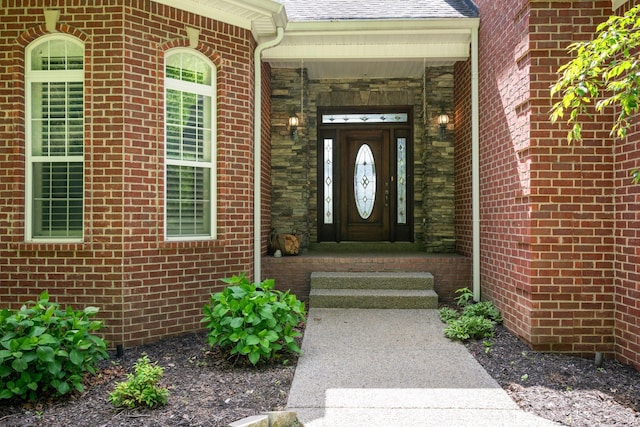 1709 Wildlife Trl, Kingston Springs, TN 37082 - doorway to property with roof with shingles and brick siding
