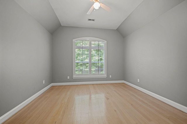 1709 Wildlife Trl, Kingston Springs, TN 37082 - empty room with light wood-style flooring, baseboards, ceiling fan, and vaulted ceiling