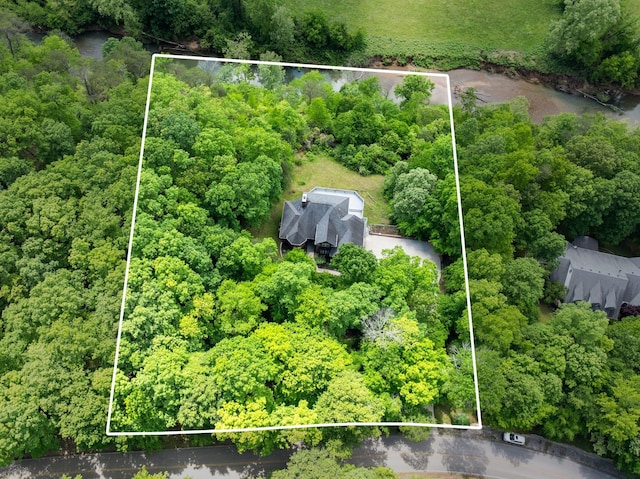 1709 Wildlife Trl, Kingston Springs, TN 37082 - aerial view of property and surrounding area featuring property boundaries highlighted and a forest