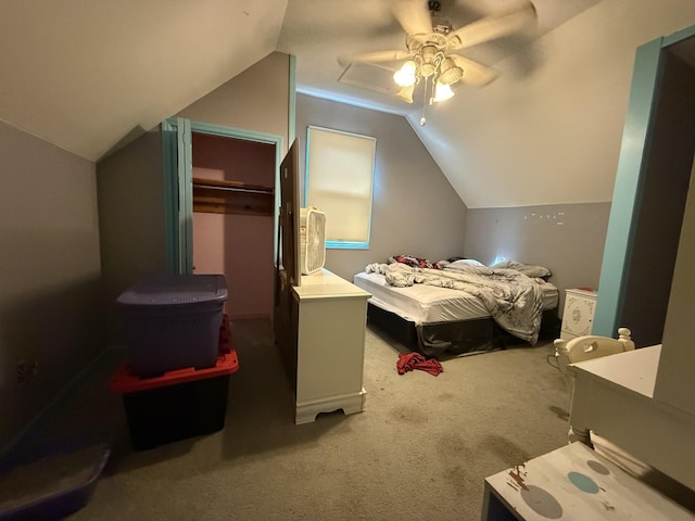 carpeted bedroom with vaulted ceiling and ceiling fan