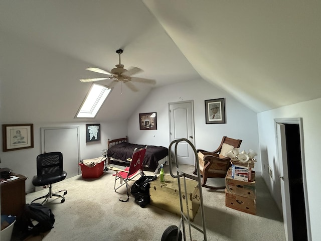 bedroom with carpet, vaulted ceiling, and a ceiling fan
