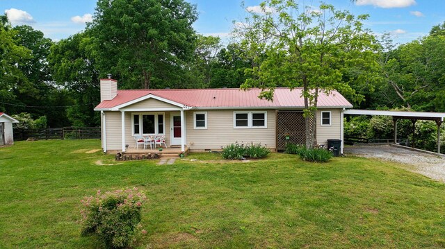 251 Old Sr 48, Centerville, TN 37033 - ranch-style house featuring gravel driveway, a carport, crawl space, metal roof, and a chimney