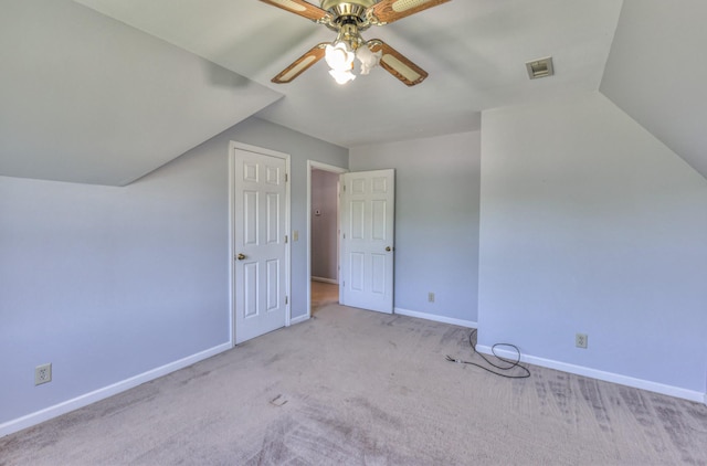 bonus room with a ceiling fan, baseboards, vaulted ceiling, and carpet floors