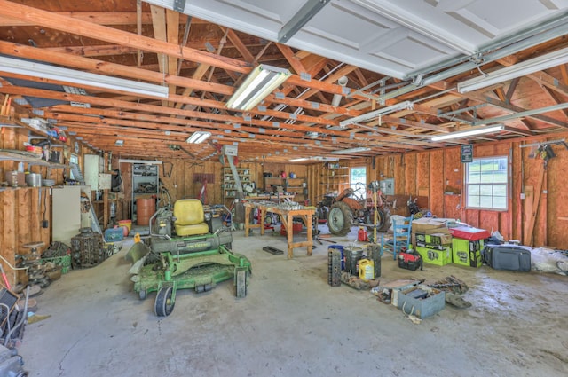garage with a workshop area