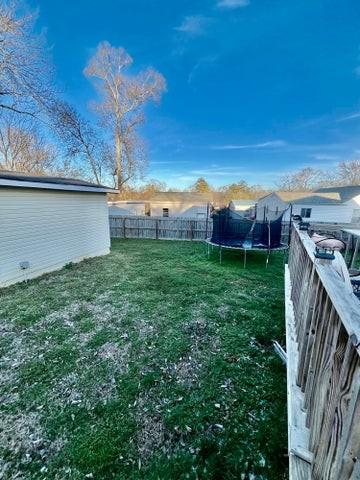 view of yard with a trampoline