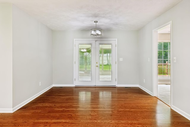 2907 York Rd, Pleasant View, TN 37146 - entryway with plenty of natural light, a chandelier, wood finished floors, and baseboards