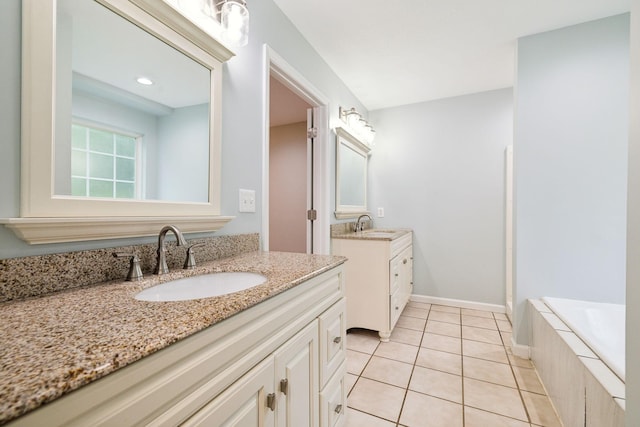 2907 York Rd, Pleasant View, TN 37146 - full bathroom featuring two vanities, tile patterned floors, and a relaxing tiled tub