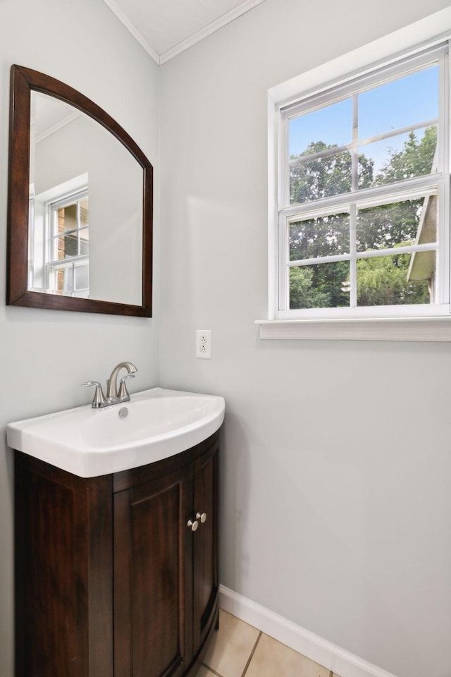 2907 York Rd, Pleasant View, TN 37146 - bathroom with ornamental molding, vanity, baseboards, and tile patterned floors