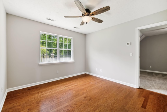 2907 York Rd, Pleasant View, TN 37146 - empty room featuring ceiling fan, wood finished floors, and baseboards