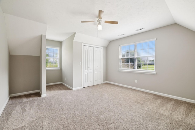2907 York Rd, Pleasant View, TN 37146 - unfurnished bedroom featuring carpet floors, vaulted ceiling, baseboards, a closet, and ceiling fan
