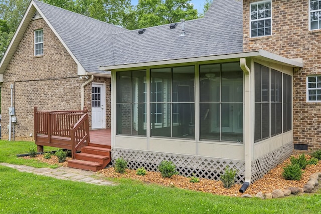2907 York Rd, Pleasant View, TN 37146 - view of home's exterior featuring a sunroom, brick siding, a shingled roof, and a wooden deck